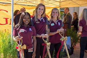 Students Pose with Shovels at Groundbreaking
