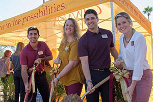 Students Pose with Shovels at Groundbreaking