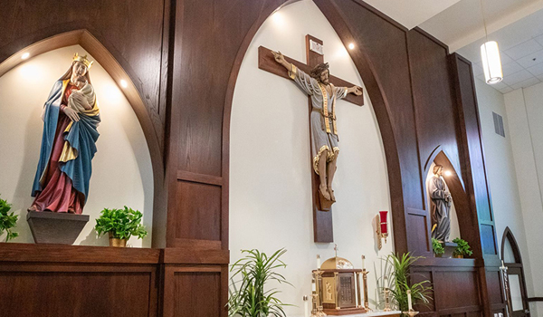 New statues of Mary and Joseph hang prominently in the newly renovated Mary, Seat of Wisdom Chapel's sanctuary.