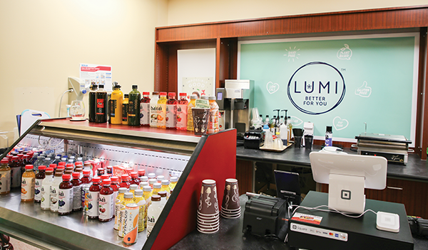 LUMI storefront shows sports drinks and coffees.